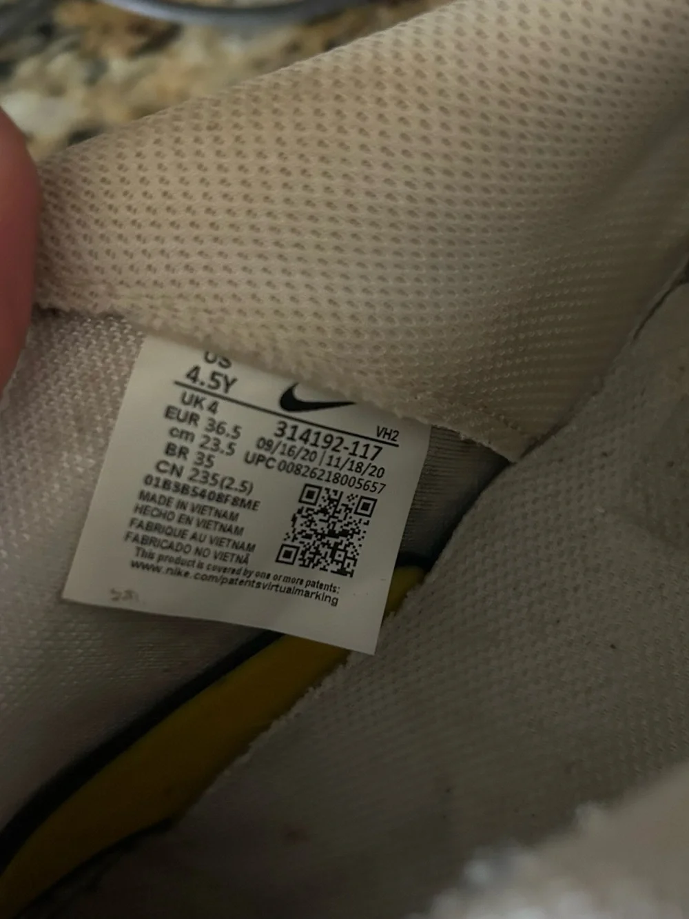 Nike Kids White Low-Top Sneakers with Subtle Off-White Tones